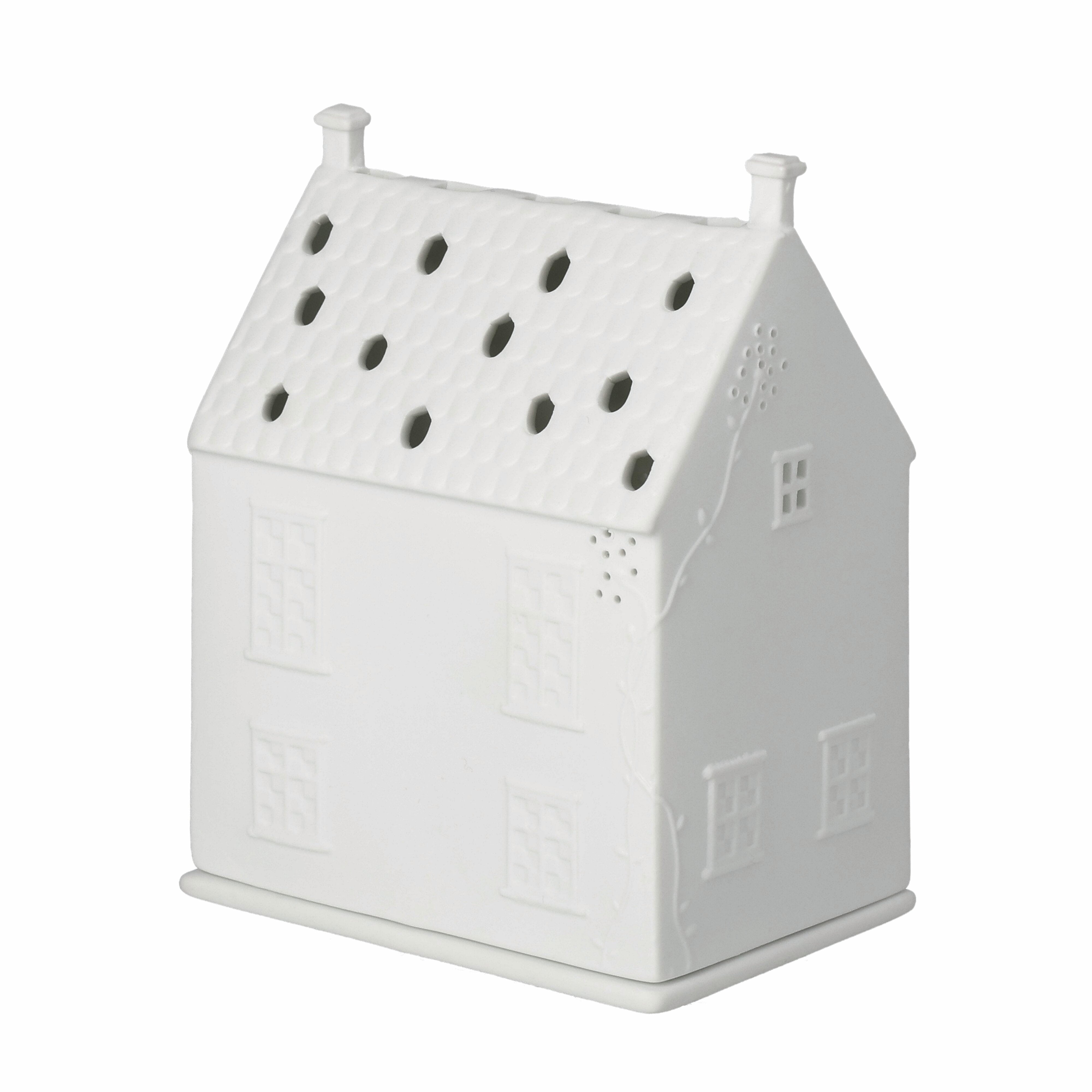 White ceramic house-shaped container on a white background