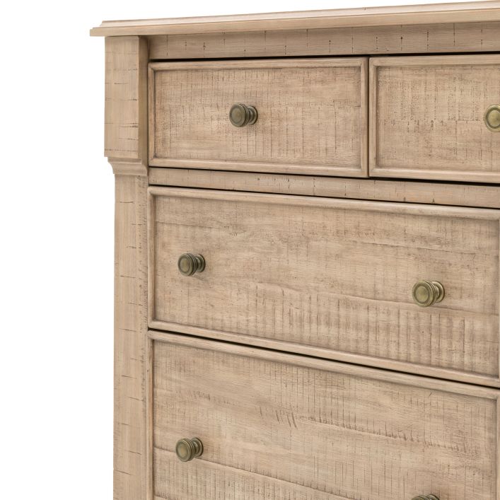 Close-up of the Vancouver 7 Drawer Chest showcasing its wood texture, top edge detail, and round drawer knobs.