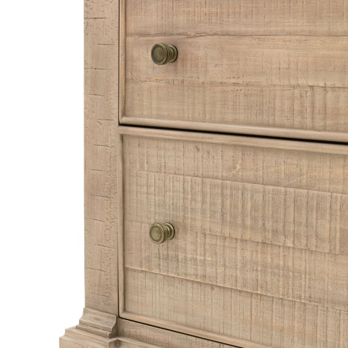 Close-up of the Vancouver 5 Drawer Chest showing detailed wood finish and metal knobs, emphasizing craftsmanship and design.
