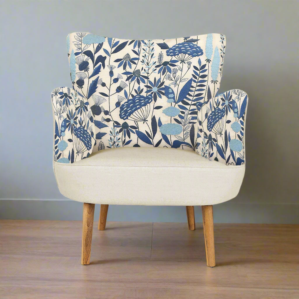 Chair with blue floral patterned backrest on a plain background