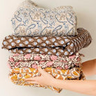 Quilt with blue, brown and sand coloured paisley pattern - WowCornwall