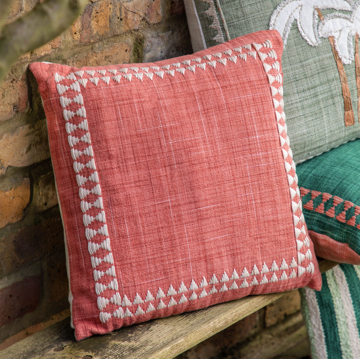 Kai Embroidered Border Showerproof Cushion - Apricot or Green - WowCornwall