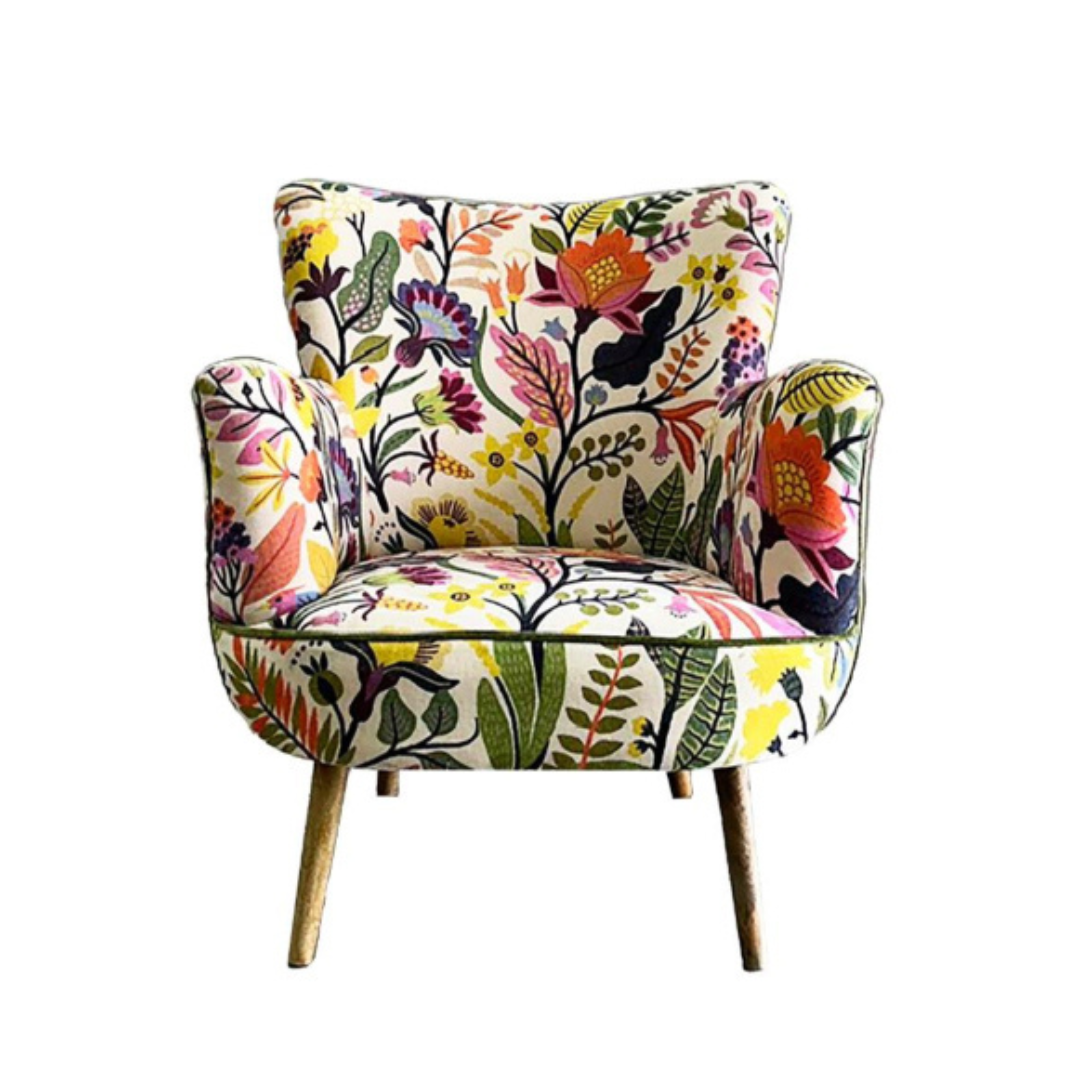 Colorful floral-patterned armchair on a white background