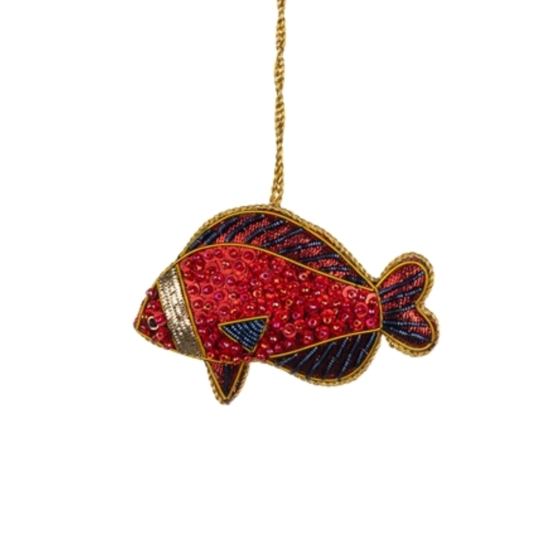 Decorative fish ornament with red and blue pattern on a white background
