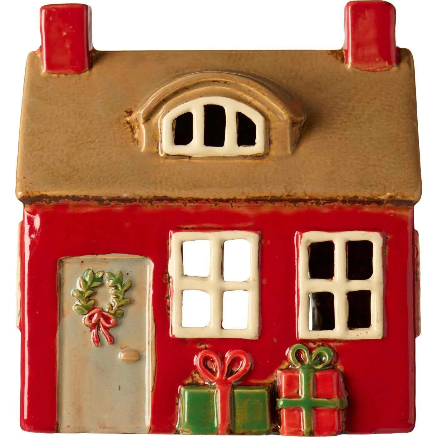 Ceramic house with door wreath and presents