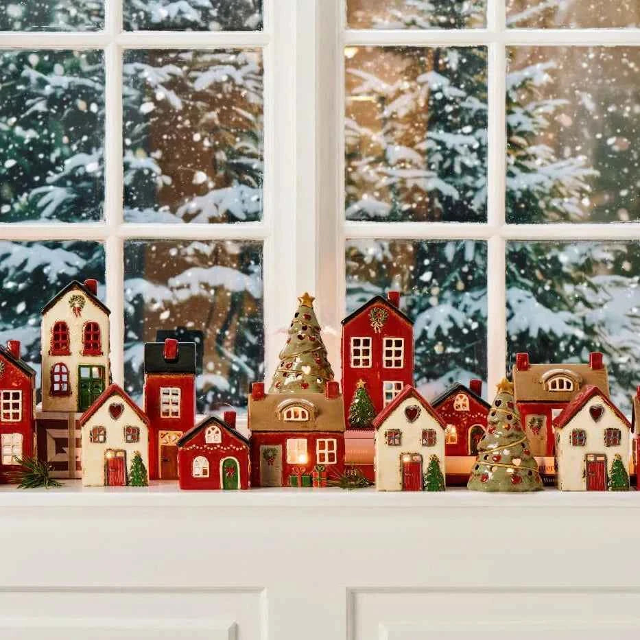 Ceramic house with door wreath and presents