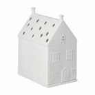 White ceramic house-shaped lantern on a white background
