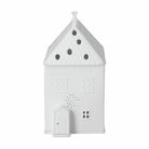 White birdhouse with a pointed roof on a white background