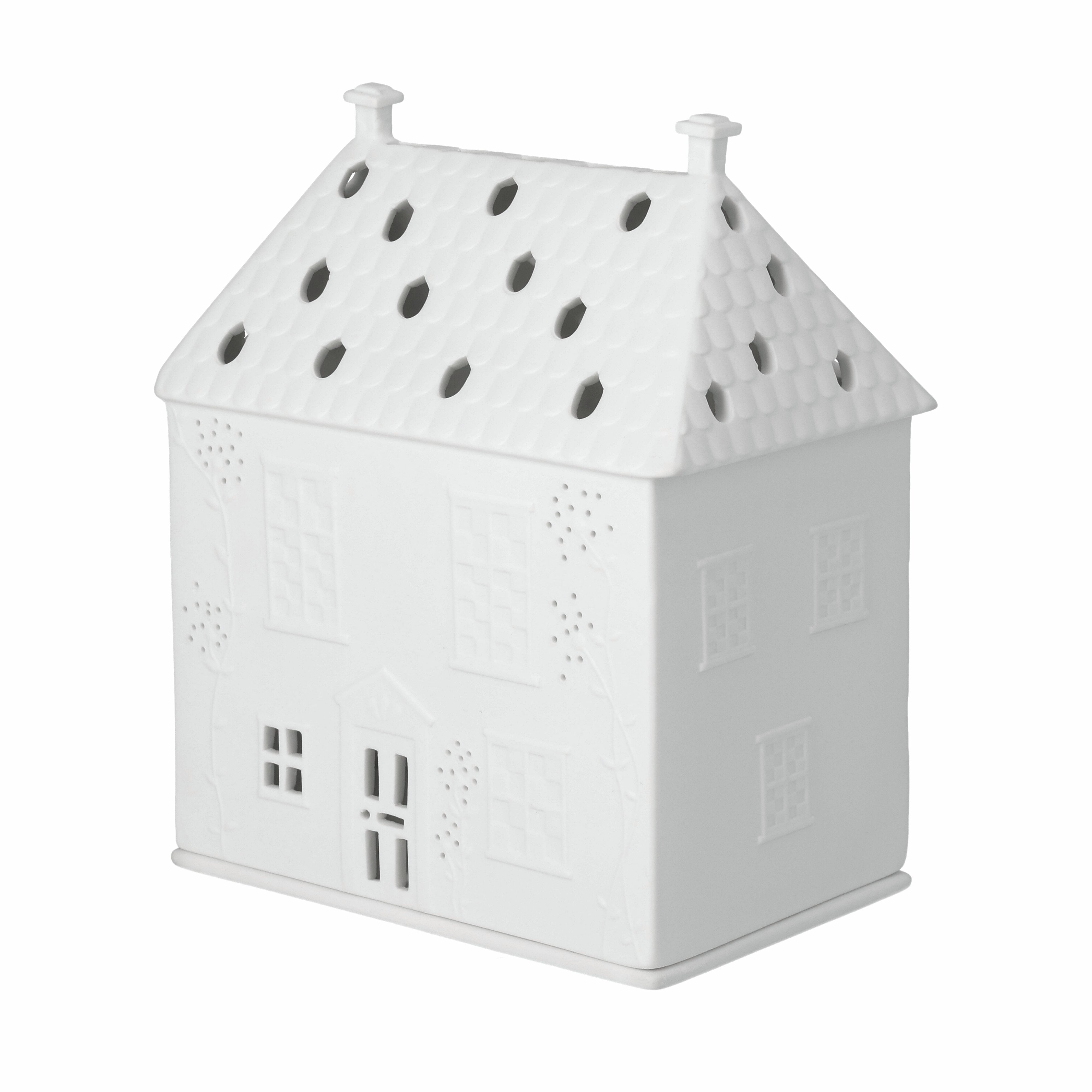 White house-shaped lantern with perforated design on a white background