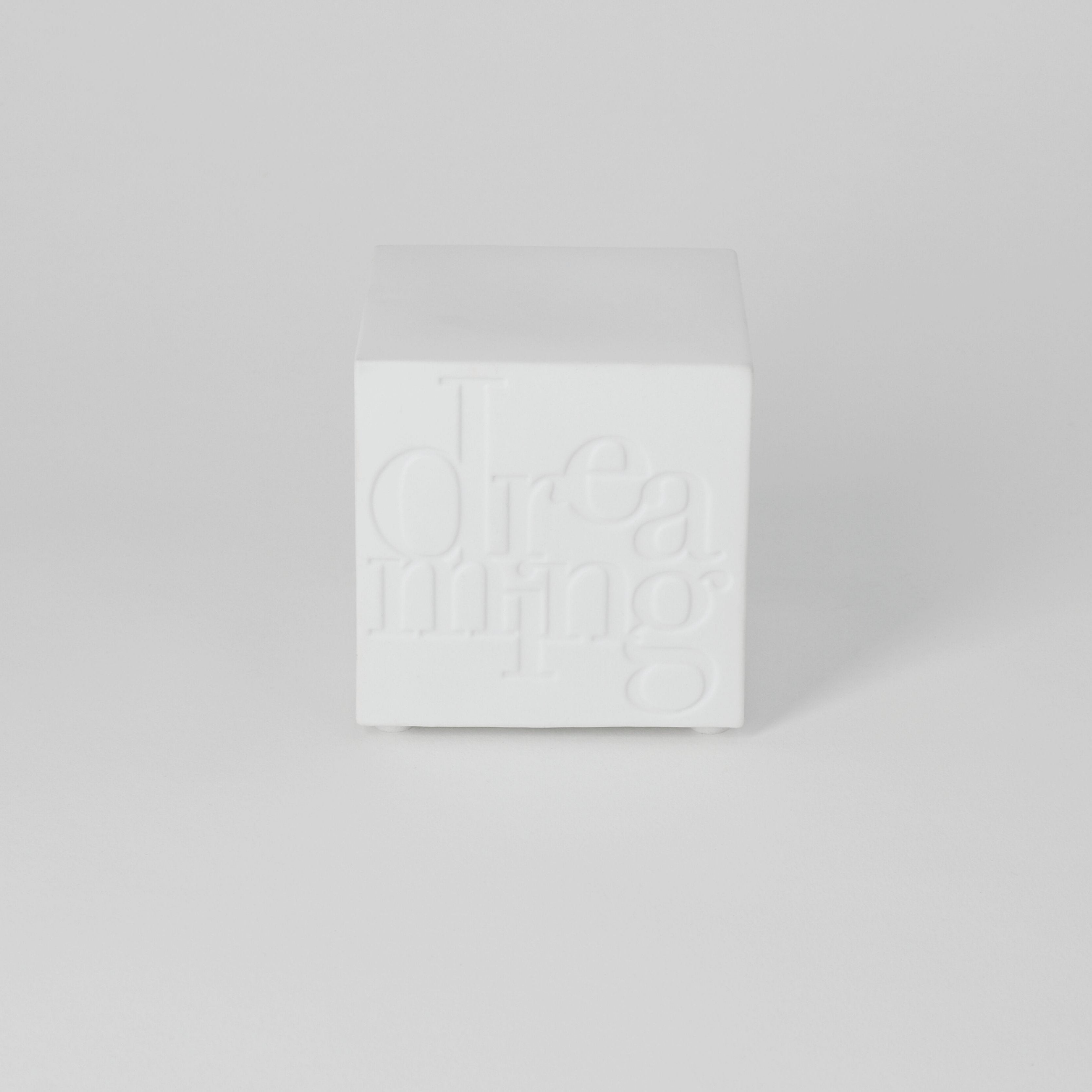 White square box with text on a light gray background