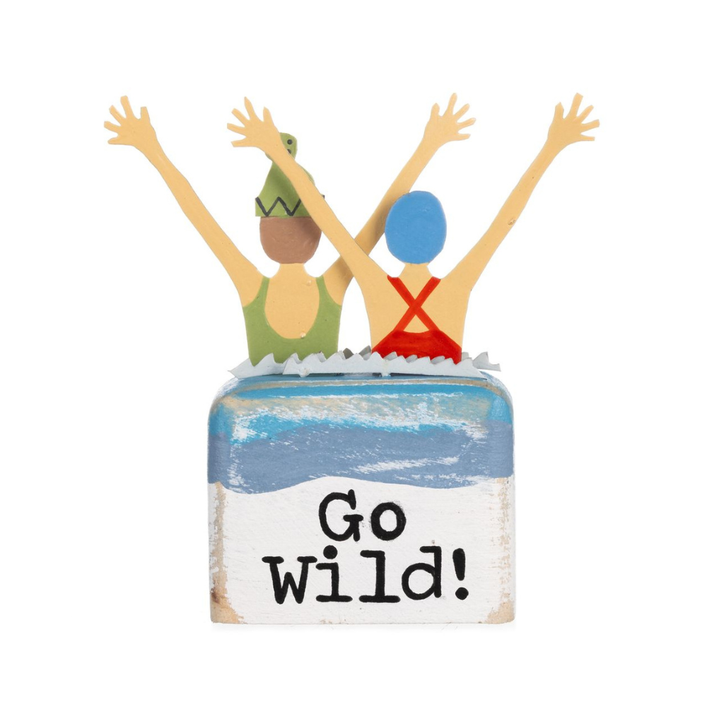 Decorative item with two figures with raised arms and 'Go Wild!' text on a beach-themed base.