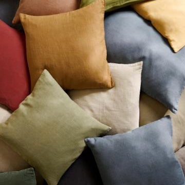 Assorted colorful pillows on a sofa