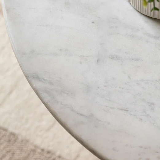 Close-up of a marble-patterned surface with a soft focus on the background