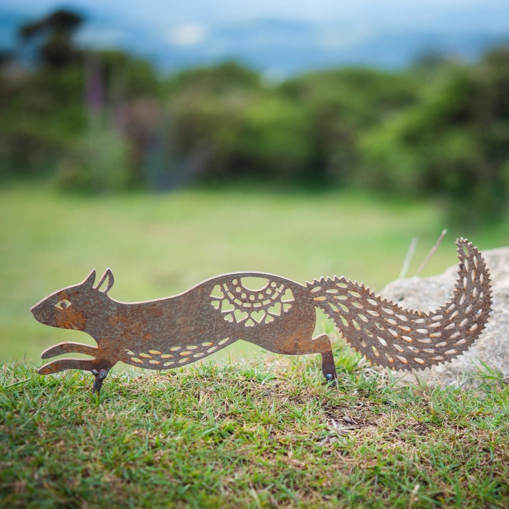 Folk squirrel sculpture with spikes - WowCornwall