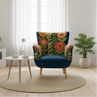 Blue armchair with floral pattern on a white background